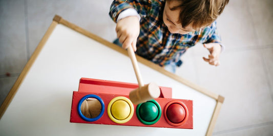 Toddler plays with toddler toys hammer ball wooden toy busy toddler toy list