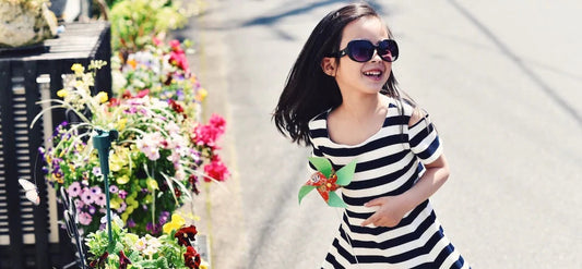 Girl in striped Dress - Try Used Kids Clothes