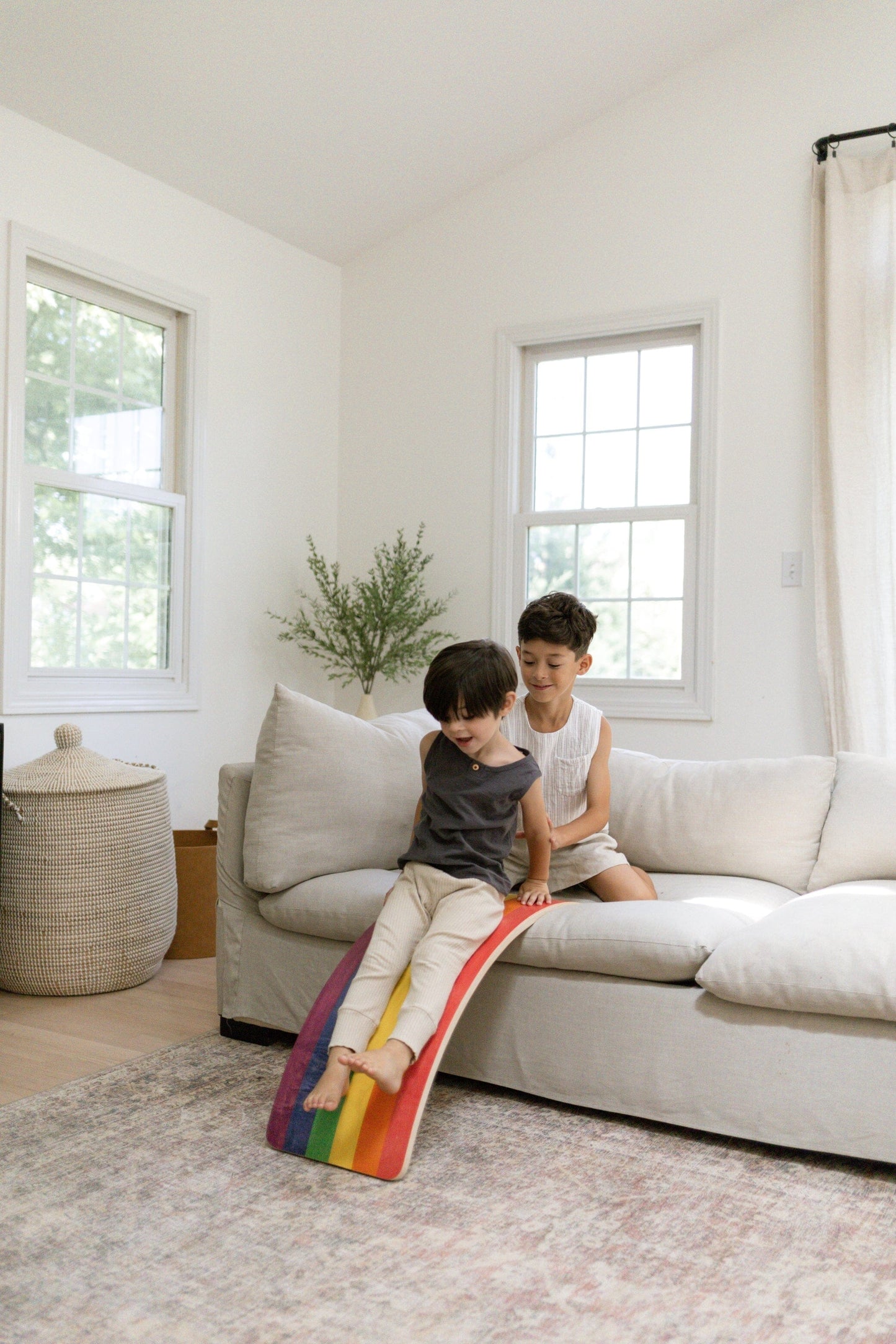 Kids playing with Montessori balance board