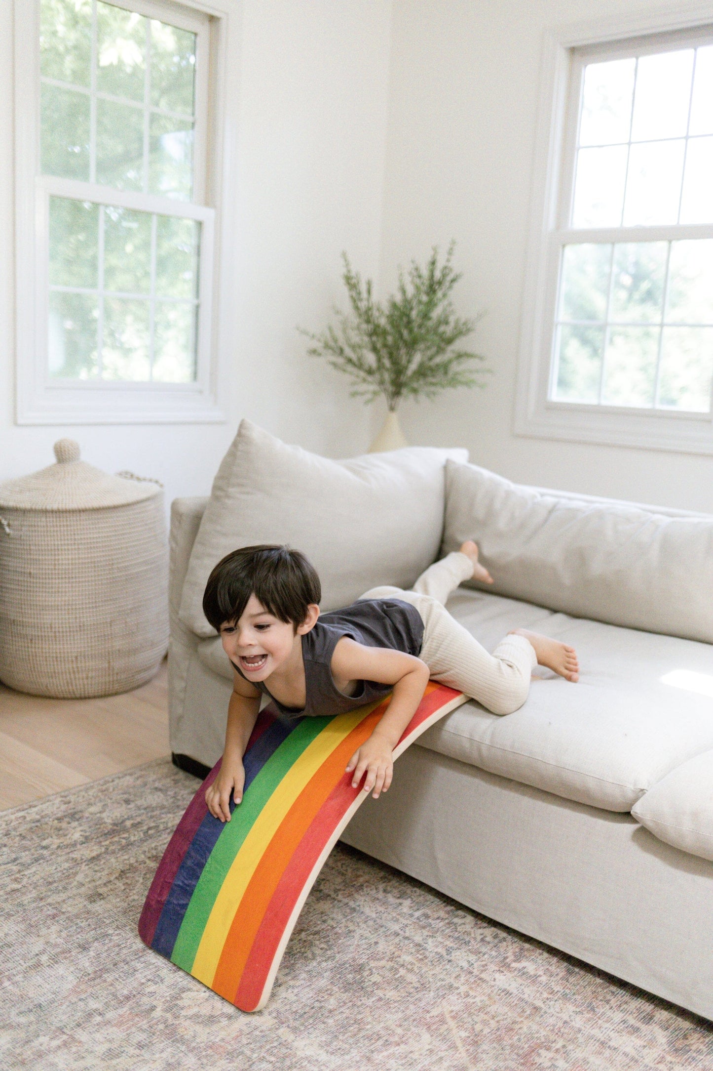 Montessori balance board in rainbow colors