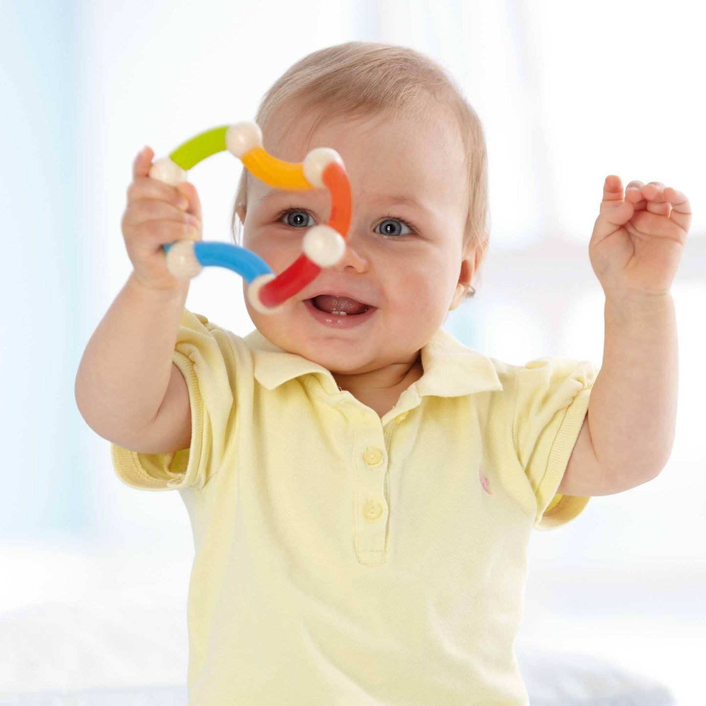Baby plays with HABA Color Snake Wooden Rattle & Fidget Toy Wooden Baby