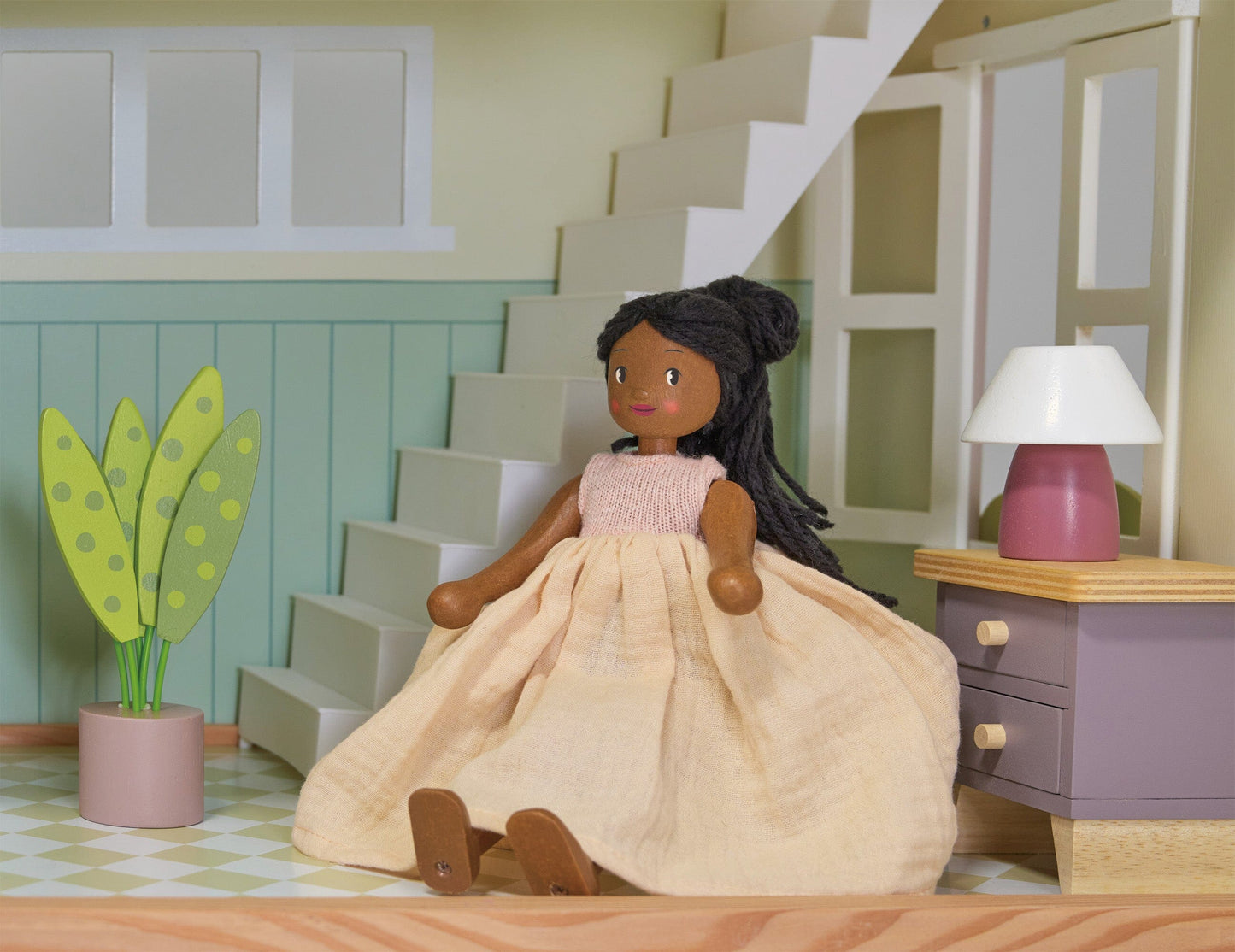 Doll positioned in Wood dollhouse with furniture Tender Leaf Mulberry Mansion