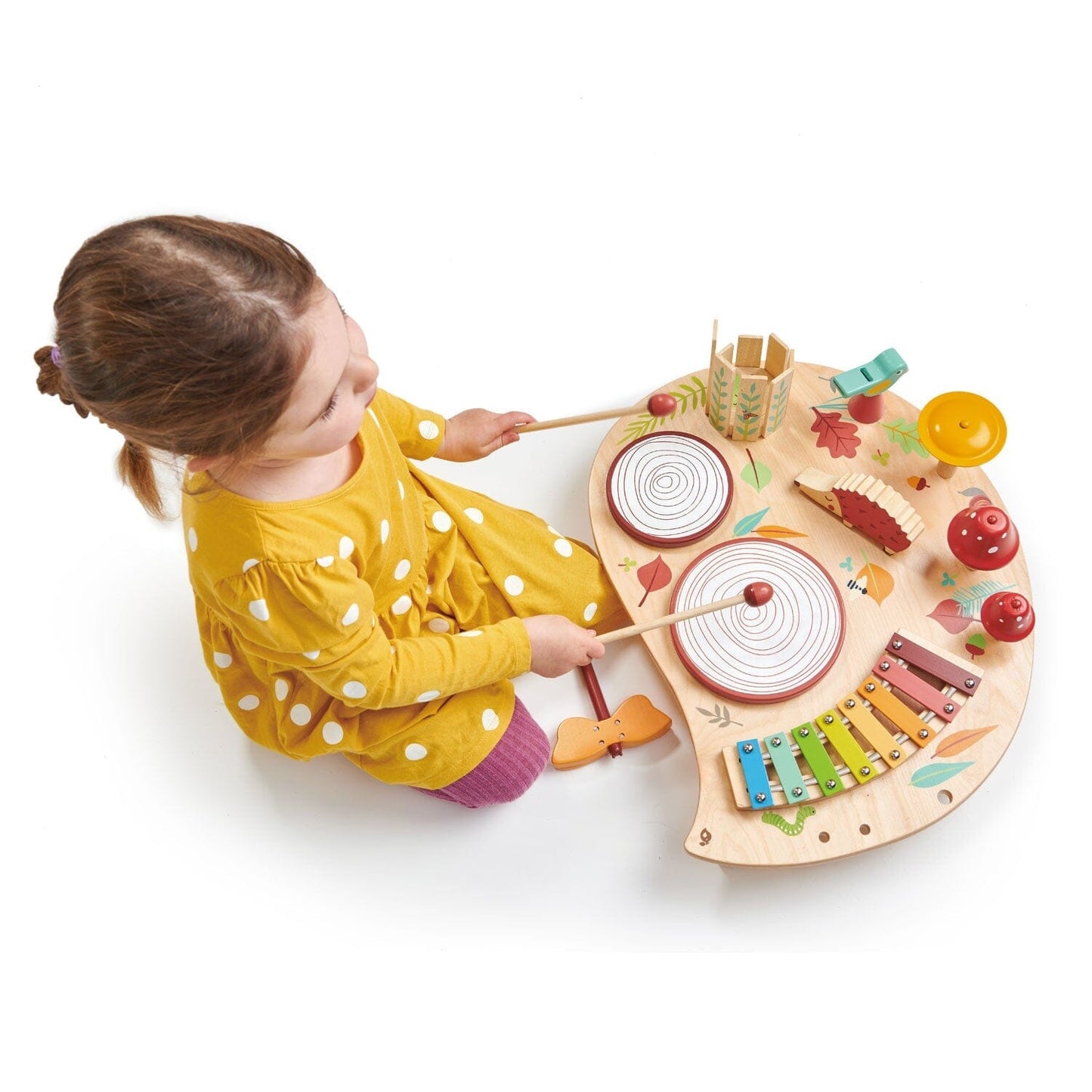 Child plays TenderLleaf Toys Musical Table