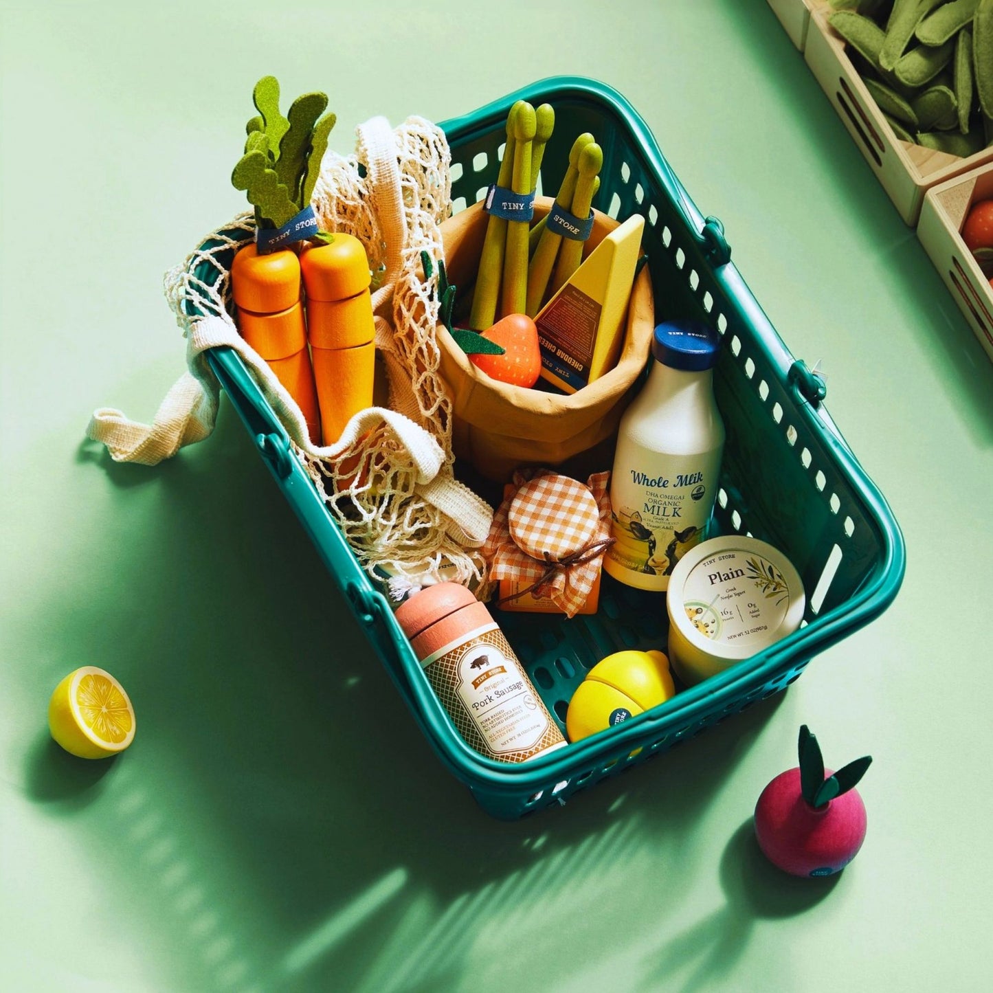 Tiny Land® Wooden Play Food Set in a basket