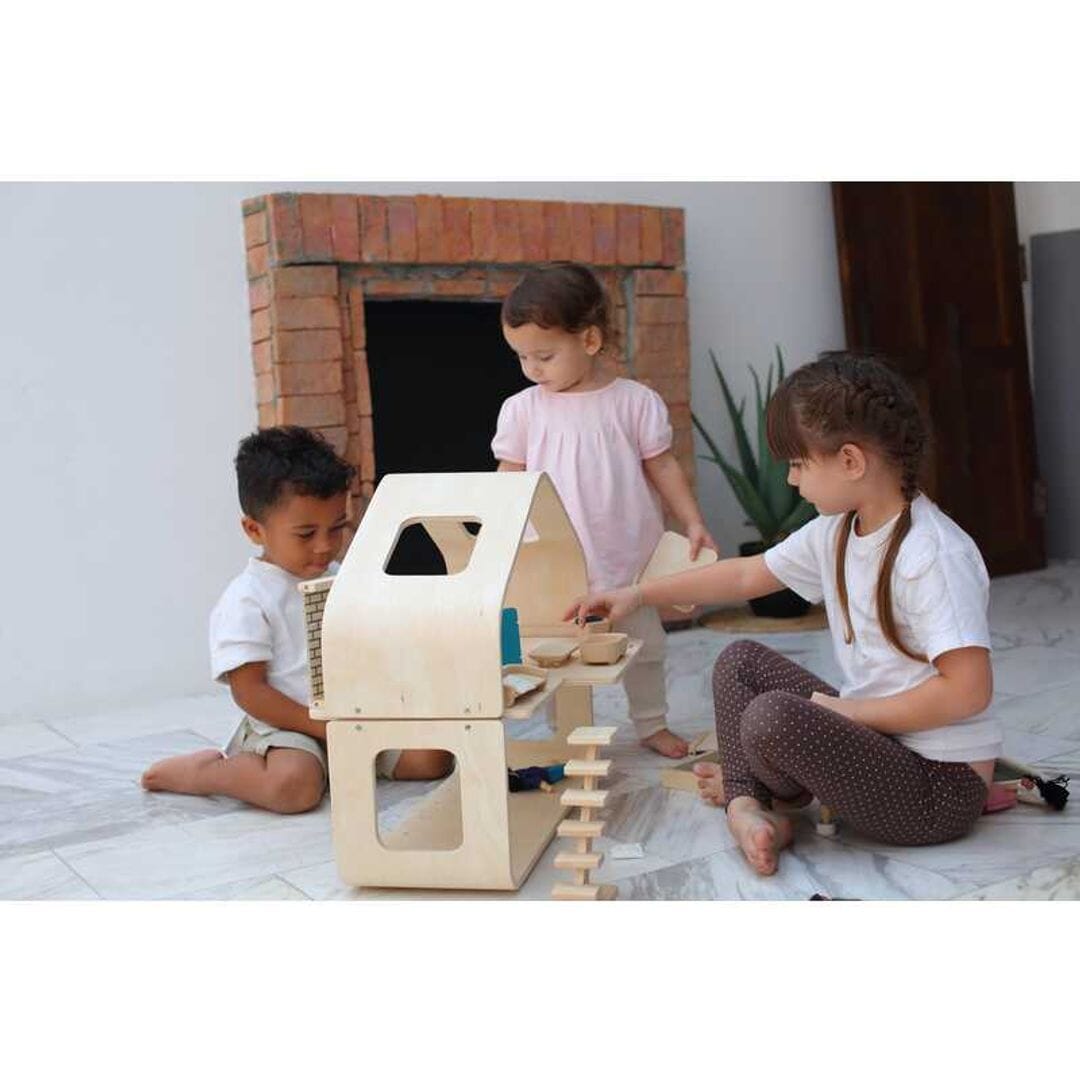 Kids play with Mid century modern dollhouse with furniture