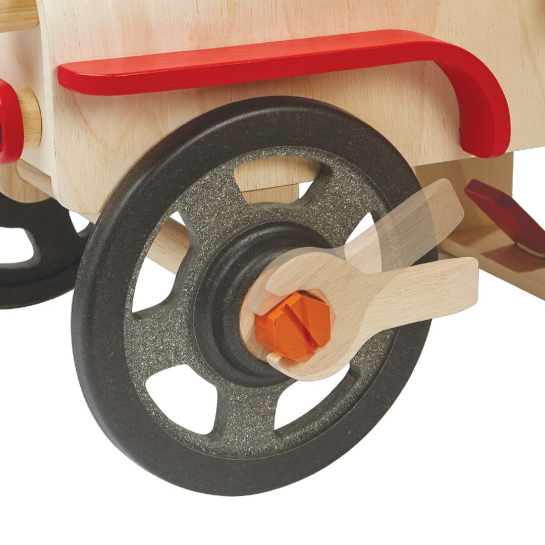 Changing wheel on PlanToys Motor Mechanic car for 3 year olds and up