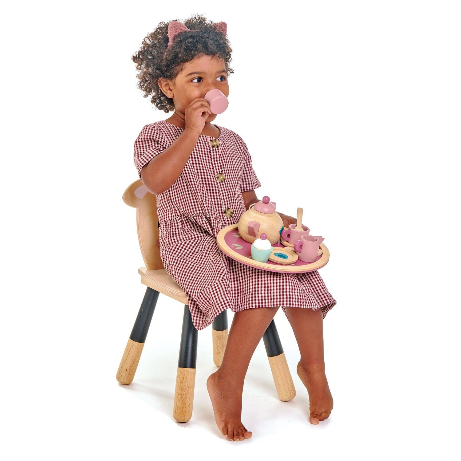 Child pretend drinking from Birdie childrens tea party set from Tender Leaf