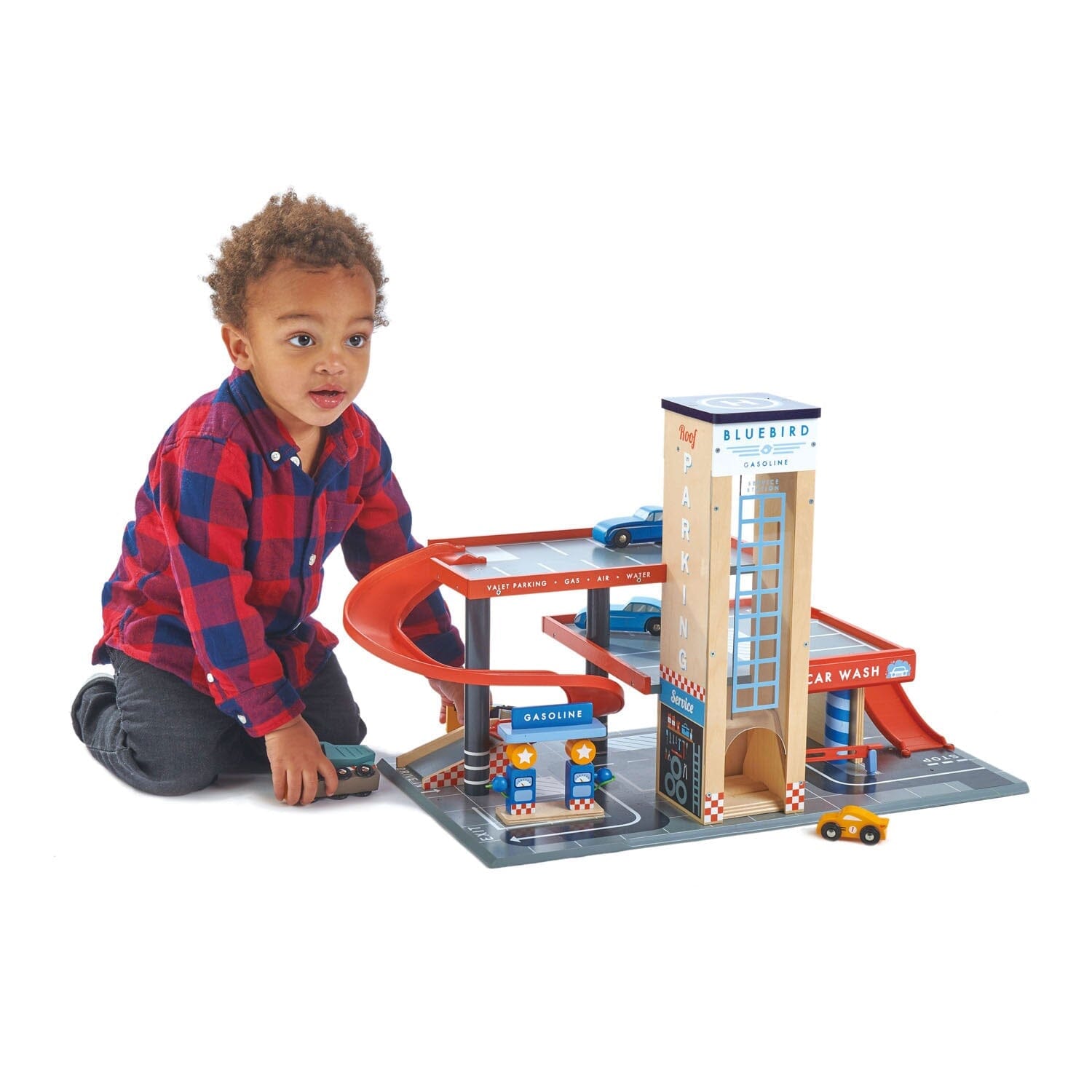 Child Plays With Blue Bird Toy Garage and Gas Station