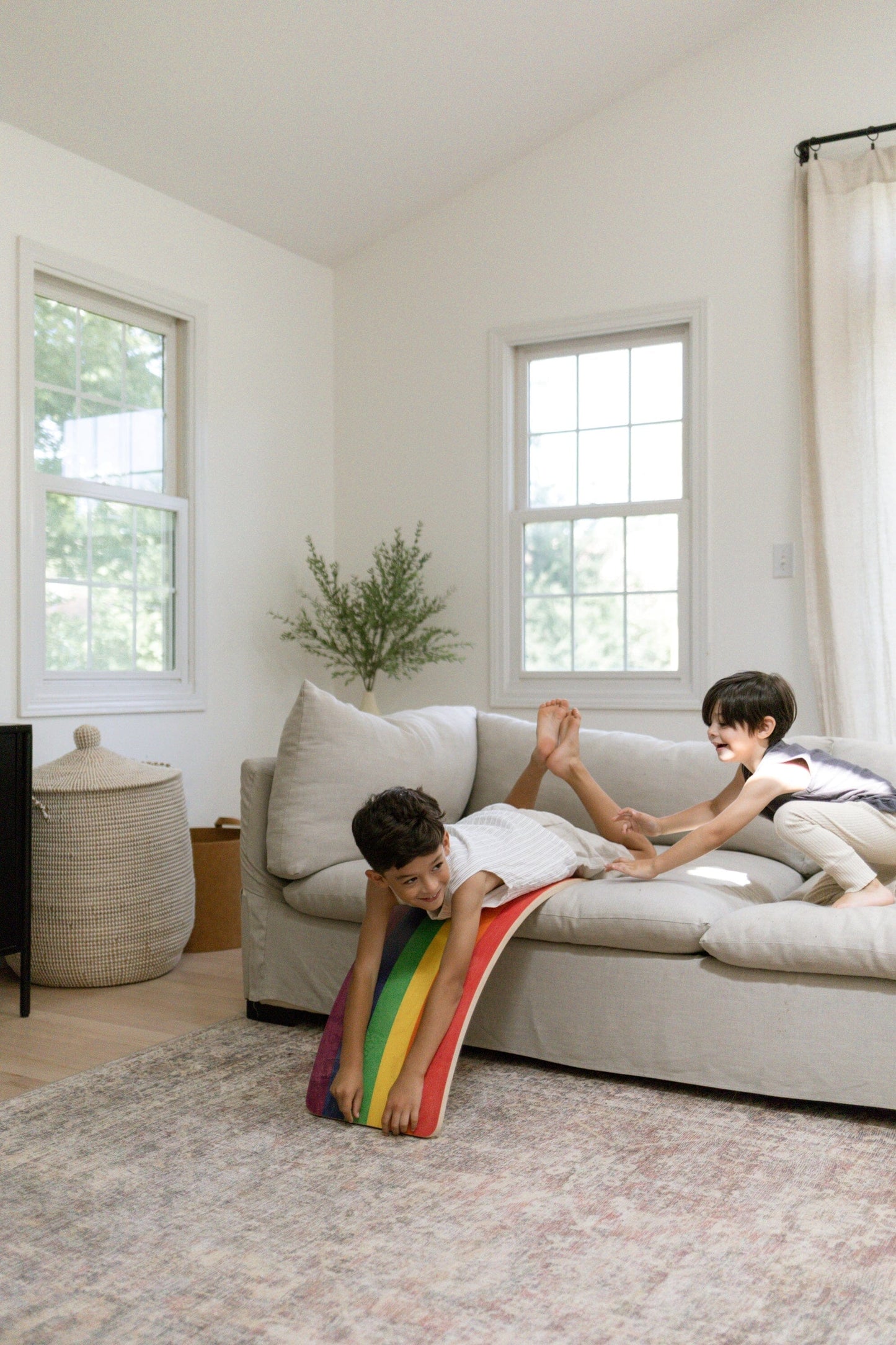 Montessori balance board in use in living room