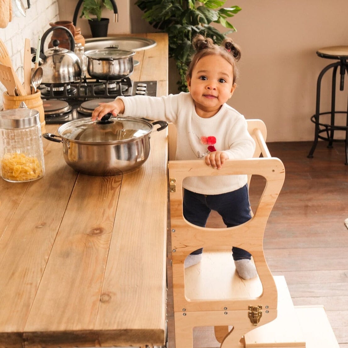 Toddler Using Woodandhearts Kitchen Tower at Counter