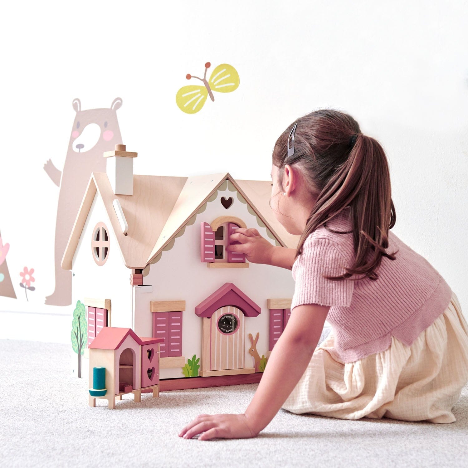 Child plays with Tender Leaf Cottontail Cottage 