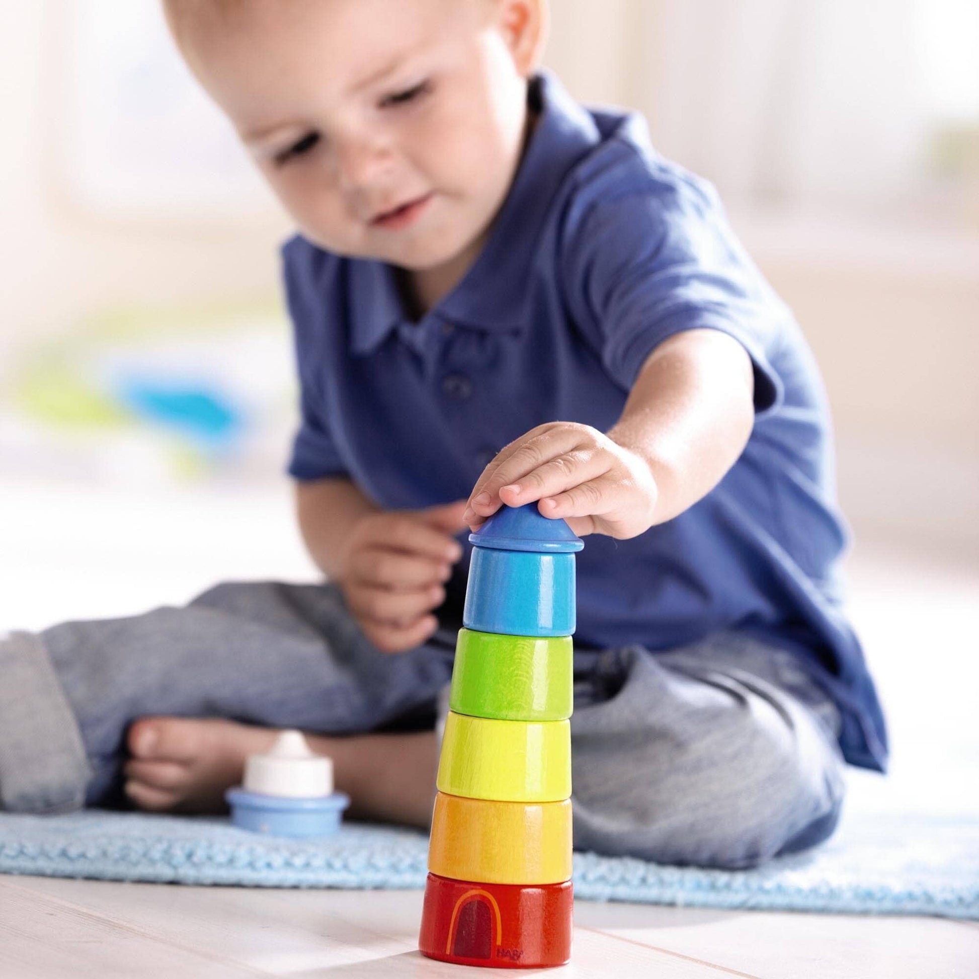 HABA USA - Lighthouse Wooden Rainbow Stacker
