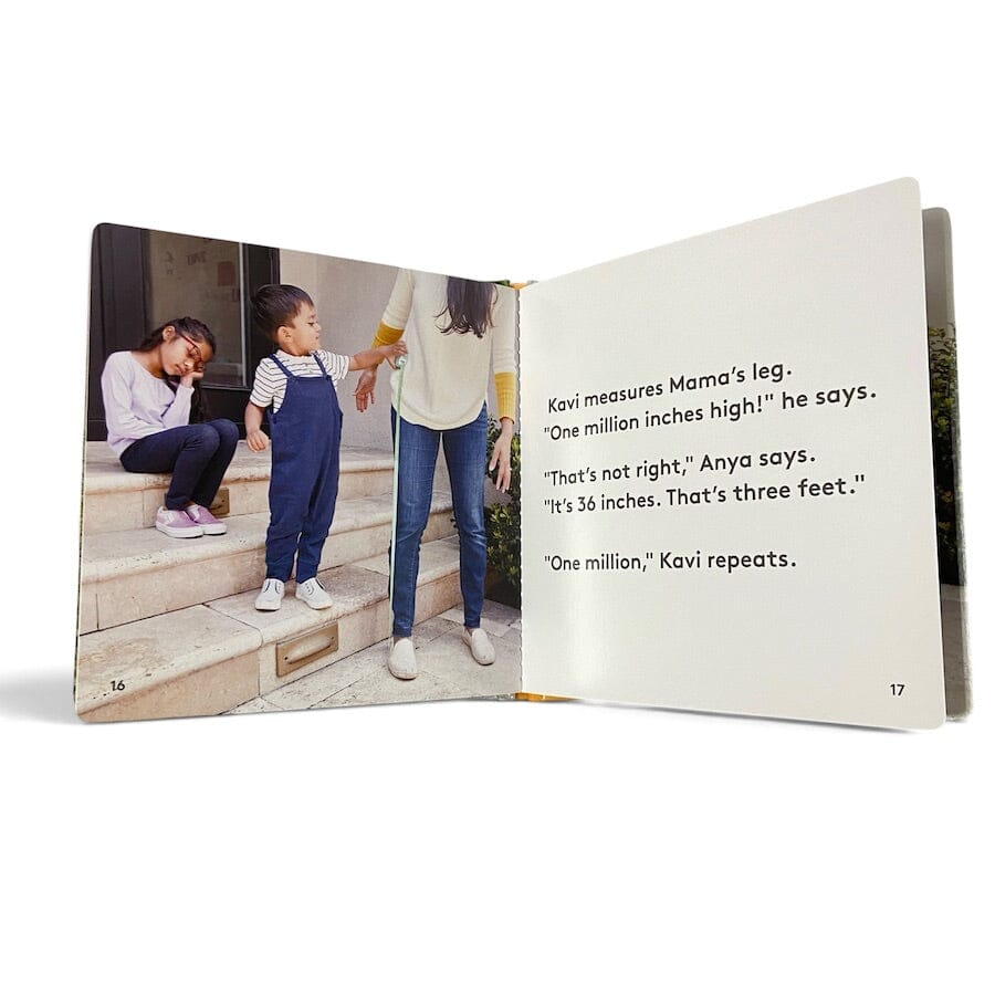 An open Measurement Day board book showing two printed pages with a photo of a woman measuring a child's leg on outdoor steps and printed text about the leg being one million inches high.