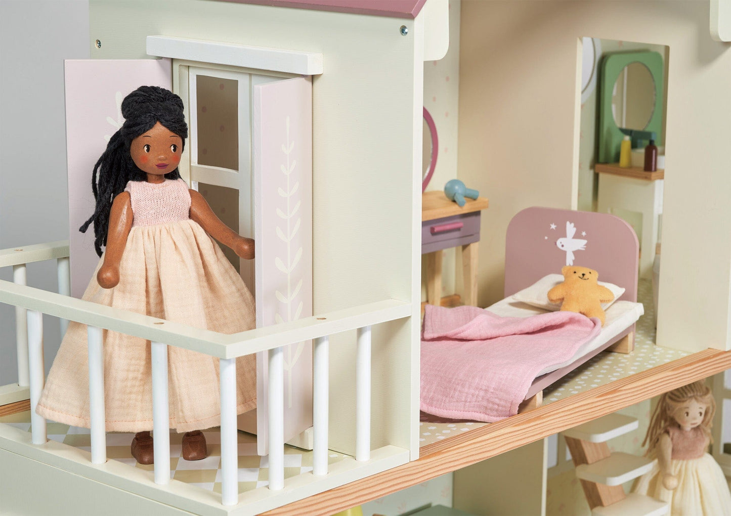 Doll positioned in Wood dollhouse with furniture Tender Leaf Mulberry Mansion 