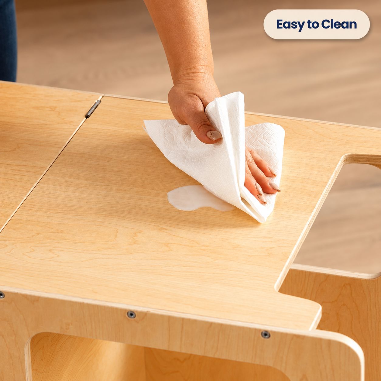 Easy-to-clean wooden surface of the 4-in-1 Toddler Tower