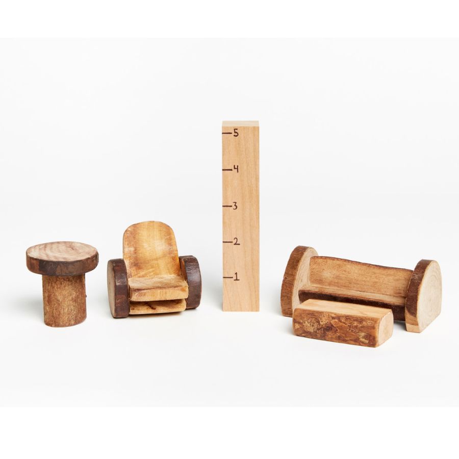 A Tree Blocks set of four small handcrafted wooden furniture pieces, including a bench, chair, table, and block, displayed with a ruler for scale on a clean white background.