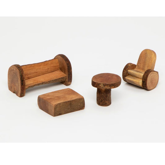A Tree Blocks set of four small handcrafted wooden furniture pieces, including a bench, chair, table, and block, displayed on a clean white background.