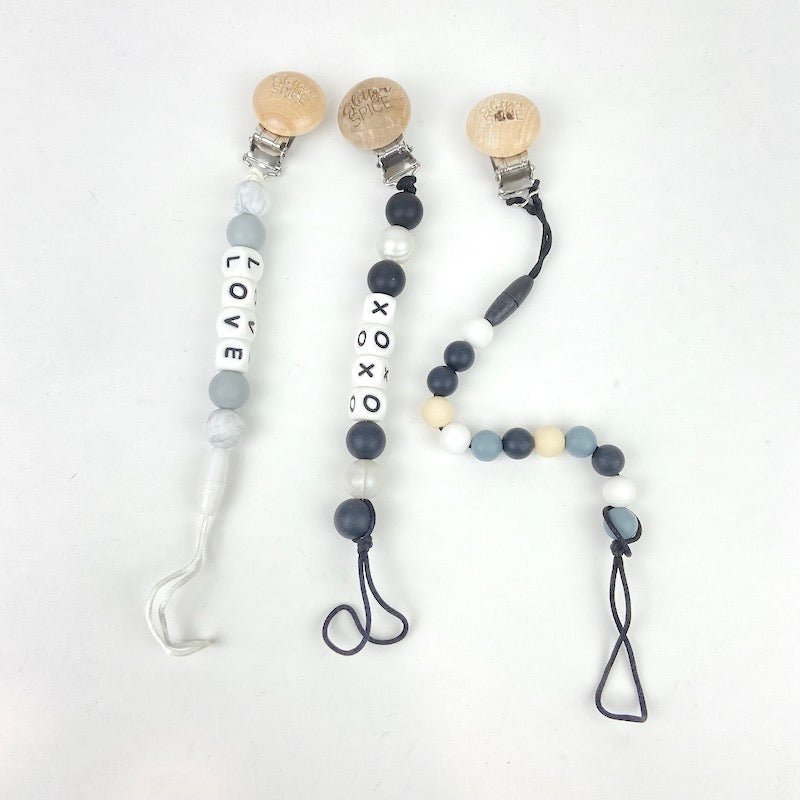 TOYCYCLE - Glitter & Spice Pacifier Clip - Monochrome