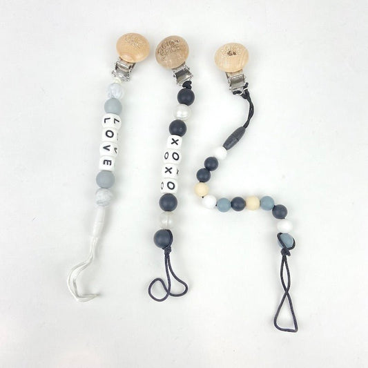 TOYCYCLE - Glitter & Spice Pacifier Clip - Monochrome