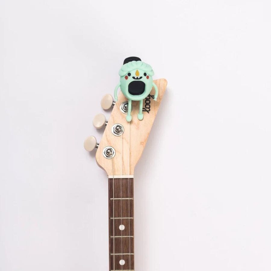 Loog Monster Tuner clip-on tuner for guitar, bass, ukulele, violin shown in place on a guitar