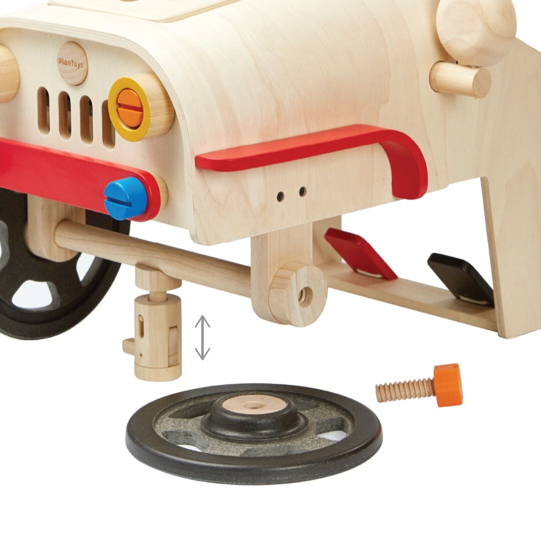 Changing wheel on PlanToys Motor Mechanic car for 3 year olds and up